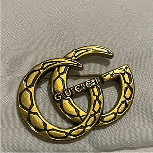 Gucci Metallic Gold Logo Brooch
